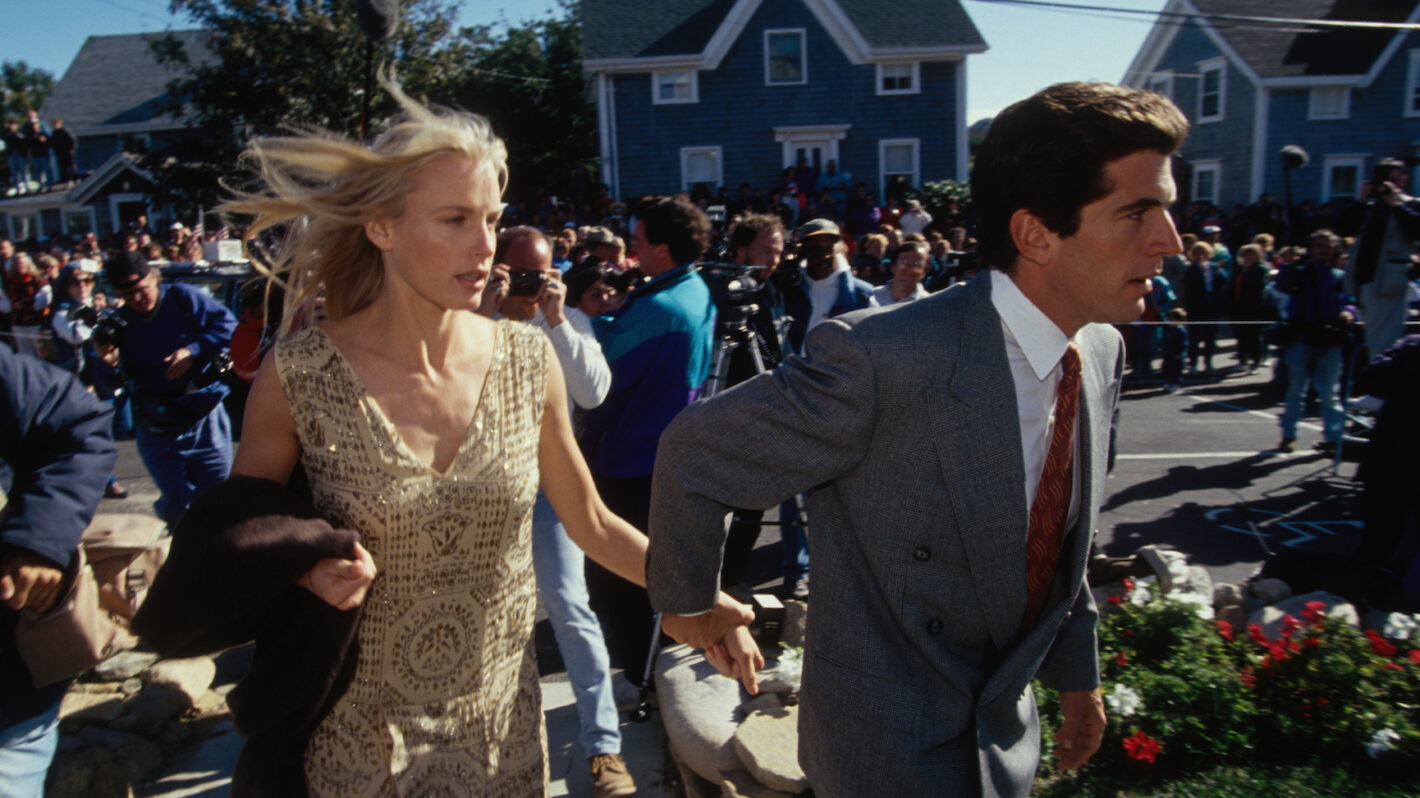 John F. Kennedy, Jr. and Daryl Hannah arrive at the wedding of his cousin Edward Kennedy, Jr. in Rhode Island.