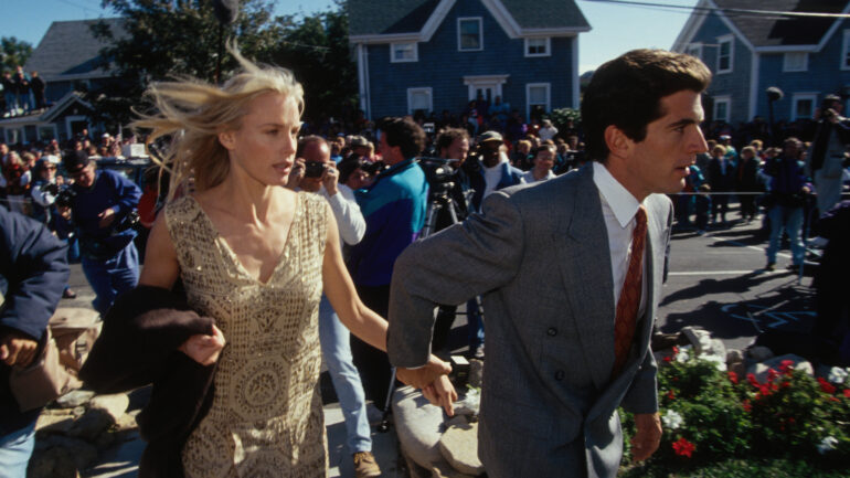 John F. Kennedy, Jr. and Daryl Hannah arrive at the wedding of his cousin Edward Kennedy, Jr. in Rhode Island.