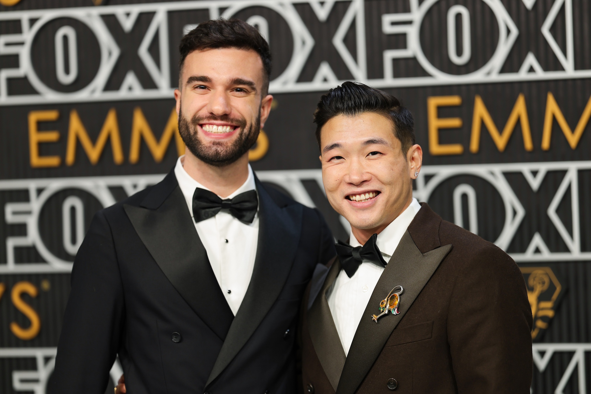John-Michael Sudsina and Joel Kim Booster attend the 75th Primetime Emmy Awards at Peacock Theater on January 15, 2024 in Los Angeles, California.