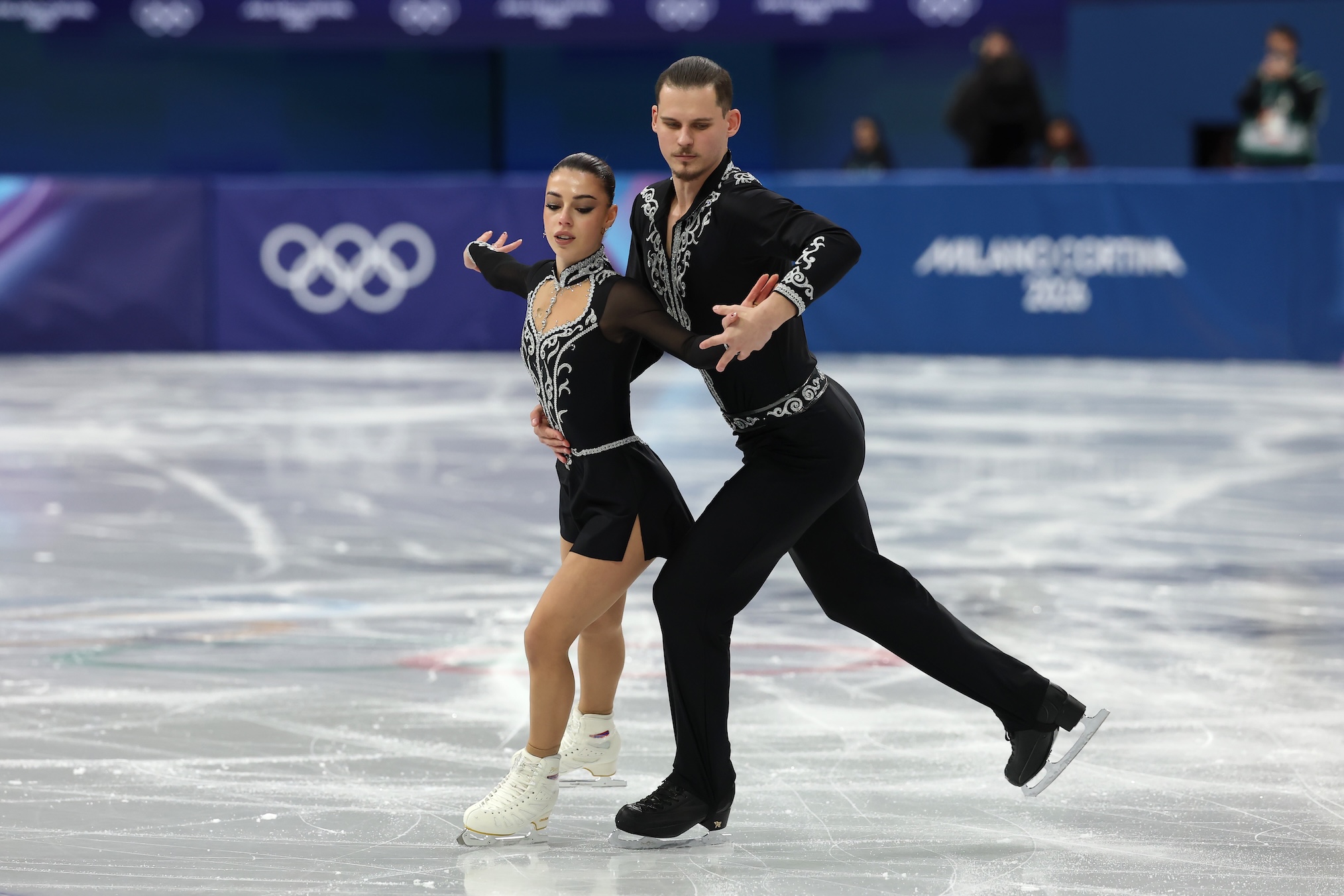 Karina Akopova and partner Nikita Rakhmanin of Team Armenia compete in Pair Skating - Short Program on day nine of the Milano Cortina 2026 Winter Olympic games at Milano Ice Skating Arena on February 15, 2026 in Milan, Italy.