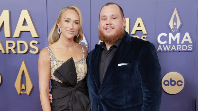 Nicole Hocking and Luke Combs attend The 58th Annual CMA Awards at Music City Center