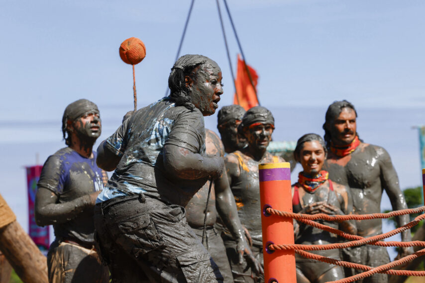 Cirie Fields competes in 'Survivor 50' premiere challenge, with Christian Hubicki, Cirie Fields, Jenna Lewis-Dougherty, Savannah Louie, and Ozzy Lusth watching behind her