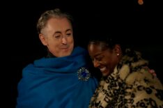 Cirie Fields, 'The Traitors' Season 1 winner, with host Alan Cumming (left)