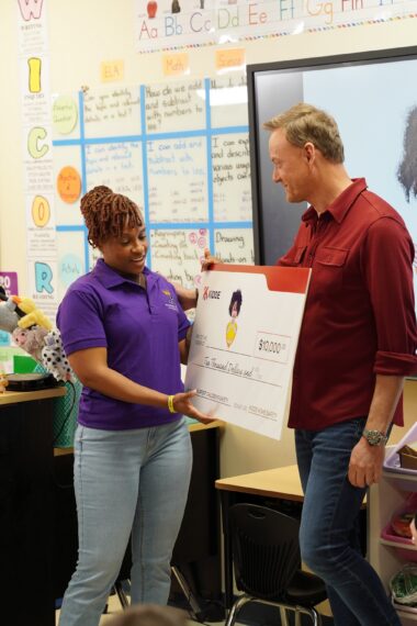 Art Edmonds filming donation from Kidde