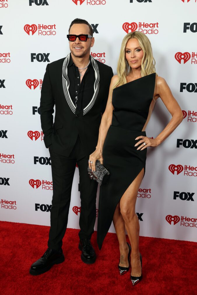Donnie Wahlberg and Jenny McCarthy attend the 2026 iHeartRadio Music Awards at Dolby Theatre on March 26, 2026 in Hollywood, California.