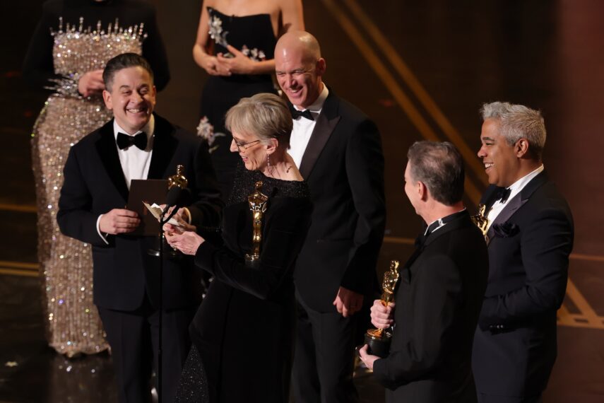 Gary A. Rizzo, Gwendolyn Yates Whittle, Gareth John, Al Nelson, and Juan Peralta accept the Sound award for "F1: The Movie" onstage during the 98th Oscars at Dolby Theatre on March 15, 2026 in Hollywood, California.