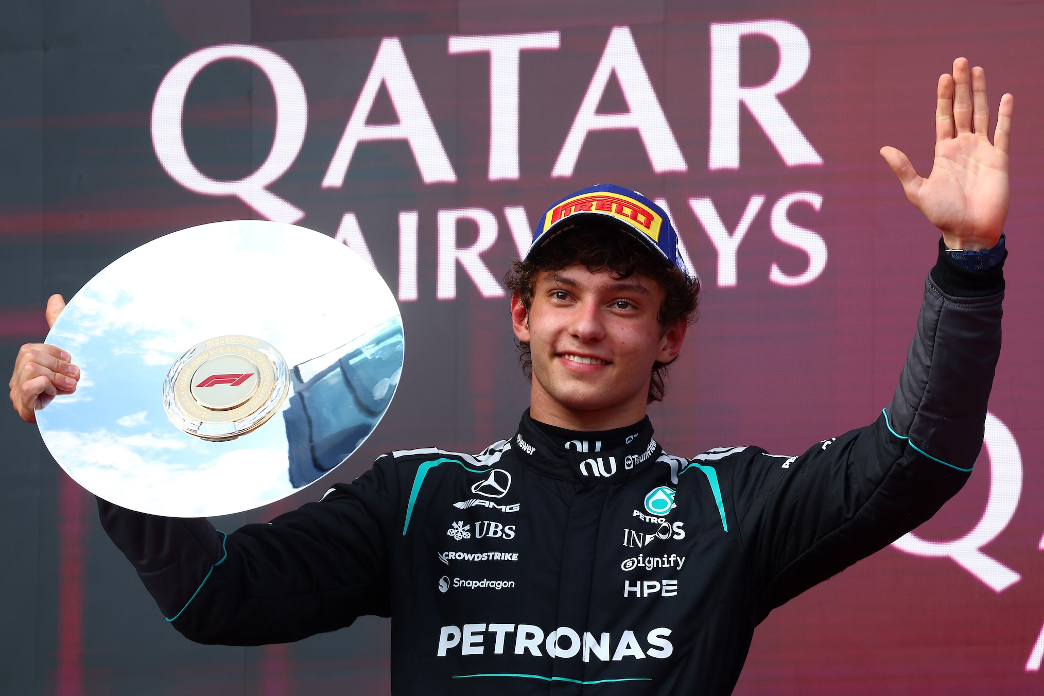 Second placed Andrea Kimi Antonelli of Italy and Mercedes AMG Petronas F1 Team celebrates on the podium with his trophy during the F1 Grand Prix of Australia at Albert Park Grand Prix Circuit on March 08, 2026 in Melbourne, Australia