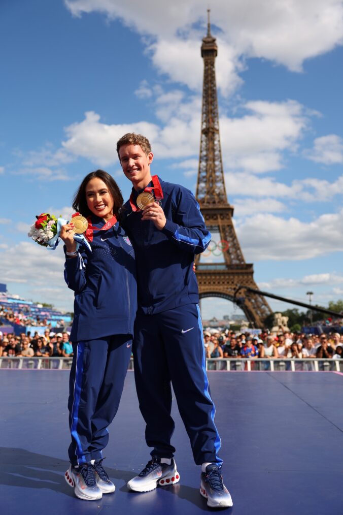 Madison Chock and Evan Bates of the U.S. Olympic figure skating team pose for a photo after receiving gold medals following the disqualification of Team Russia for doping after the 2022 Winter Games in Beijing on day twelve of the Olympic Games Paris 2024 at Champions Park on August 07, 2024 in Paris, France.