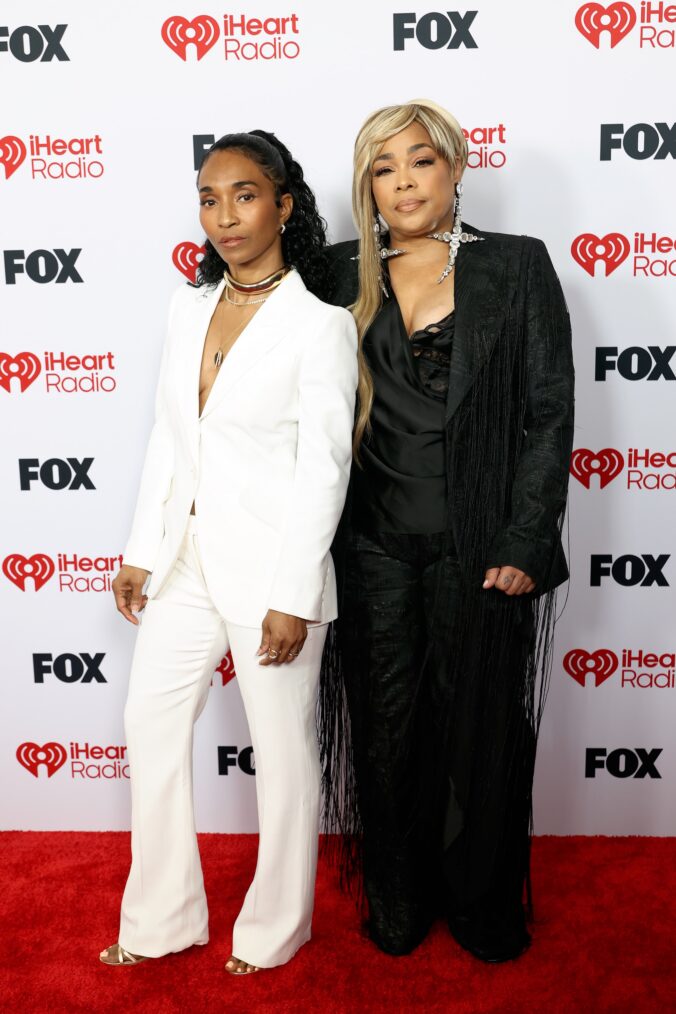 Rozonda Thomas and Tionne Tenese Watkins of TLC attend the 2026 iHeartRadio Music Awards at Dolby Theatre on March 26, 2026 in Hollywood, California.