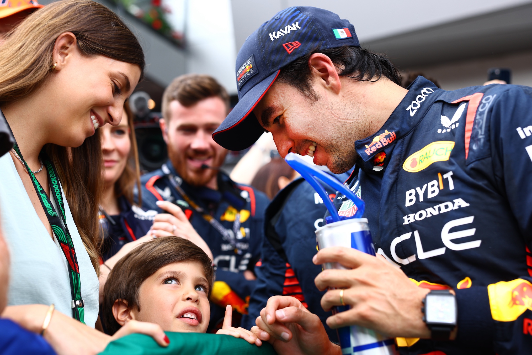 Third placed Sergio Perez of Mexico and Oracle Red Bull Racing celebrates in parc ferme with his wife Carola and son Sergio Jr during the F1 Grand Prix of Austria at Red Bull Ring on July 02, 2023 in Spielberg, Austria.