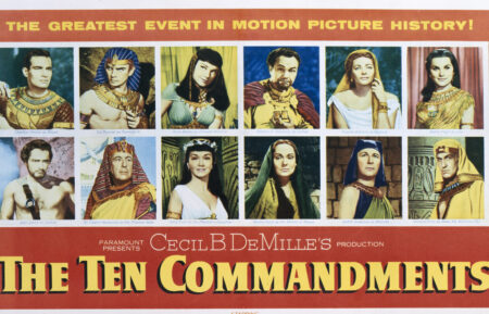 A poster for Cecil B. DeMille's 1956 adventure film 'The Ten Commandments' starring Charlton Heston, Yul Brynner, Anne Baxter, Edward G. Robinson, Yvonne De Carlo, Debra Paget, John Derek, Cedric Hardwicke, Nina Foch, Martha Scott, Judith Anderson, and Vincent Price.