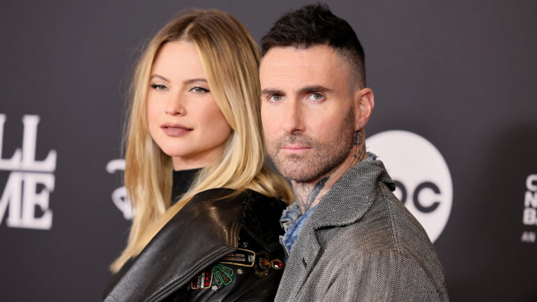 Behati Prinsloo and Adam Levine attend the 38th Annual Rock & Roll Hall Of Fame Induction