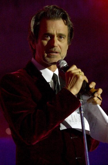 Bobby Shriver speaks on stage during the13th Annual MusiCares Person Of The Year tribute at the Marriott Marquis February 21, 2003 in New York City. Grammy winning artist Bono will be honored for his musical and humanitarian accomplishments.
