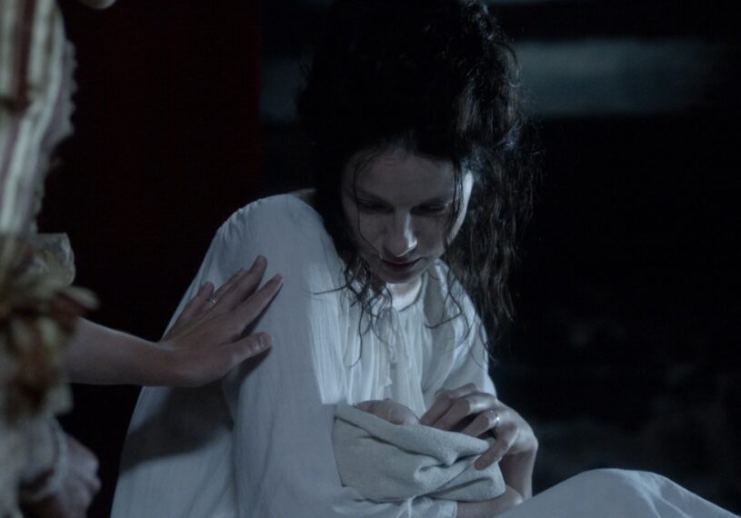 Claire holding Faith in Season 2's "Faith"