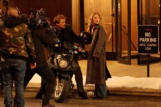 Christopher Briney and Michelle Randolph are seen filming at the 'Clashing Through the Snow' set in Downtown, Manhattan on March 12, 2026 in New York City.