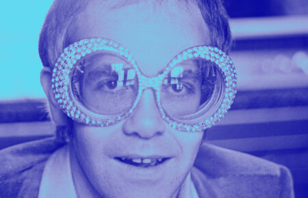 British singer-songwriter Elton John wearing a pair of his flamboyant trademark spectacles, 12th September 1974.