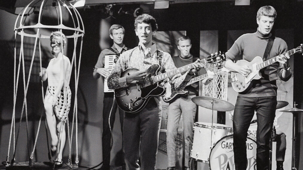 American rock and roll group Gary Lewis & the Playboys, performing with their new line-up, 1965. From left to right, John R. West on the Cordovox, lead singer Gary Lewis, and guitarists Carl Radle and Tom Tripplehorn. Tom Tripplehorn is playing a Gibson Les Paul Goldtop guitar.