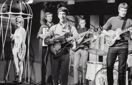 American rock and roll group Gary Lewis & the Playboys, performing with their new line-up, 1965. From left to right, John R. West on the Cordovox, lead singer Gary Lewis, and guitarists Carl Radle and Tom Tripplehorn. Tom Tripplehorn is playing a Gibson Les Paul Goldtop guitar.