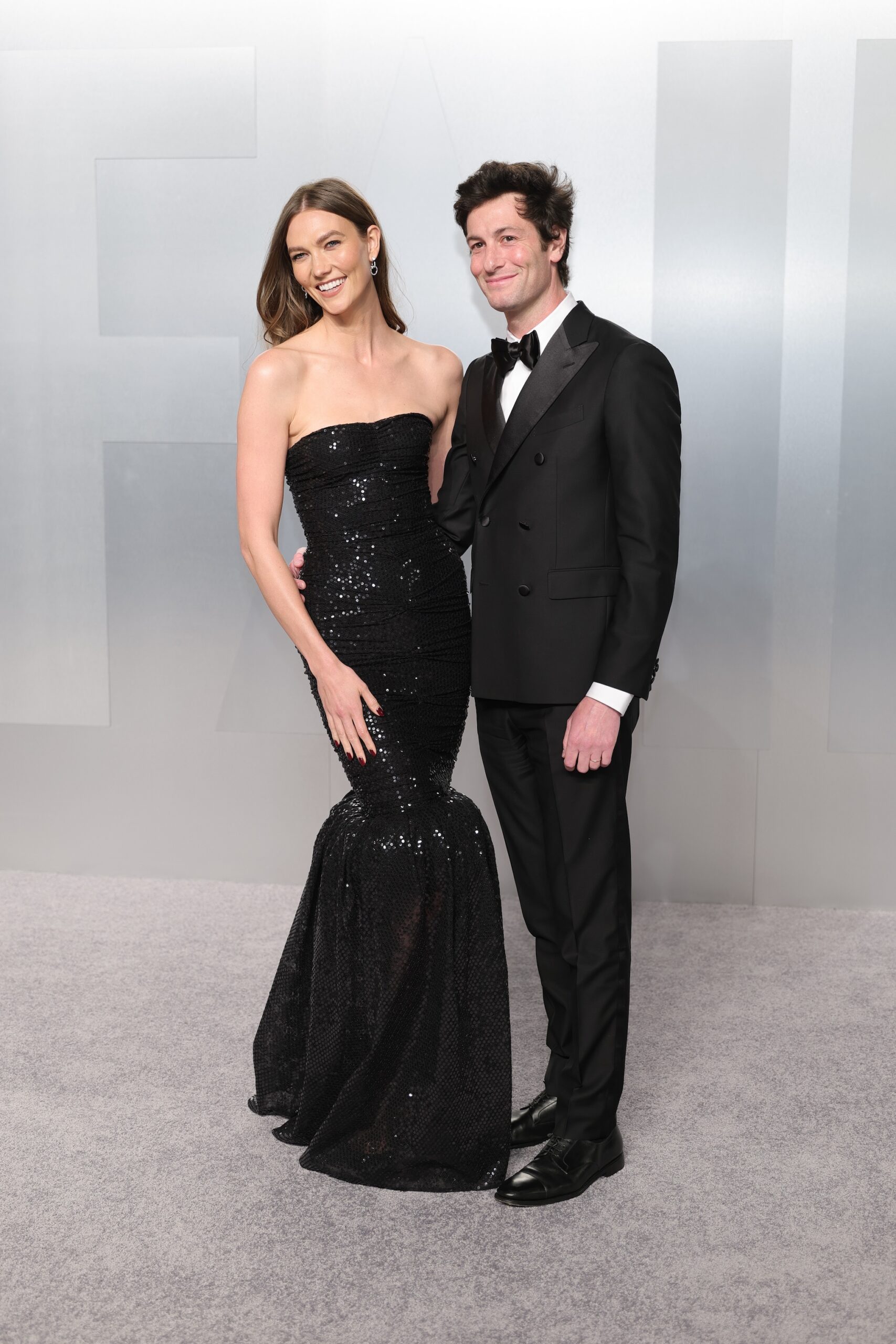 Karlie Kloss and Joshua Kushner attend the 2026 Vanity Fair Oscar Party Hosted By Mark Guiducci at Los Angeles County Museum of Art on March 15, 2026 in Los Angeles, California.