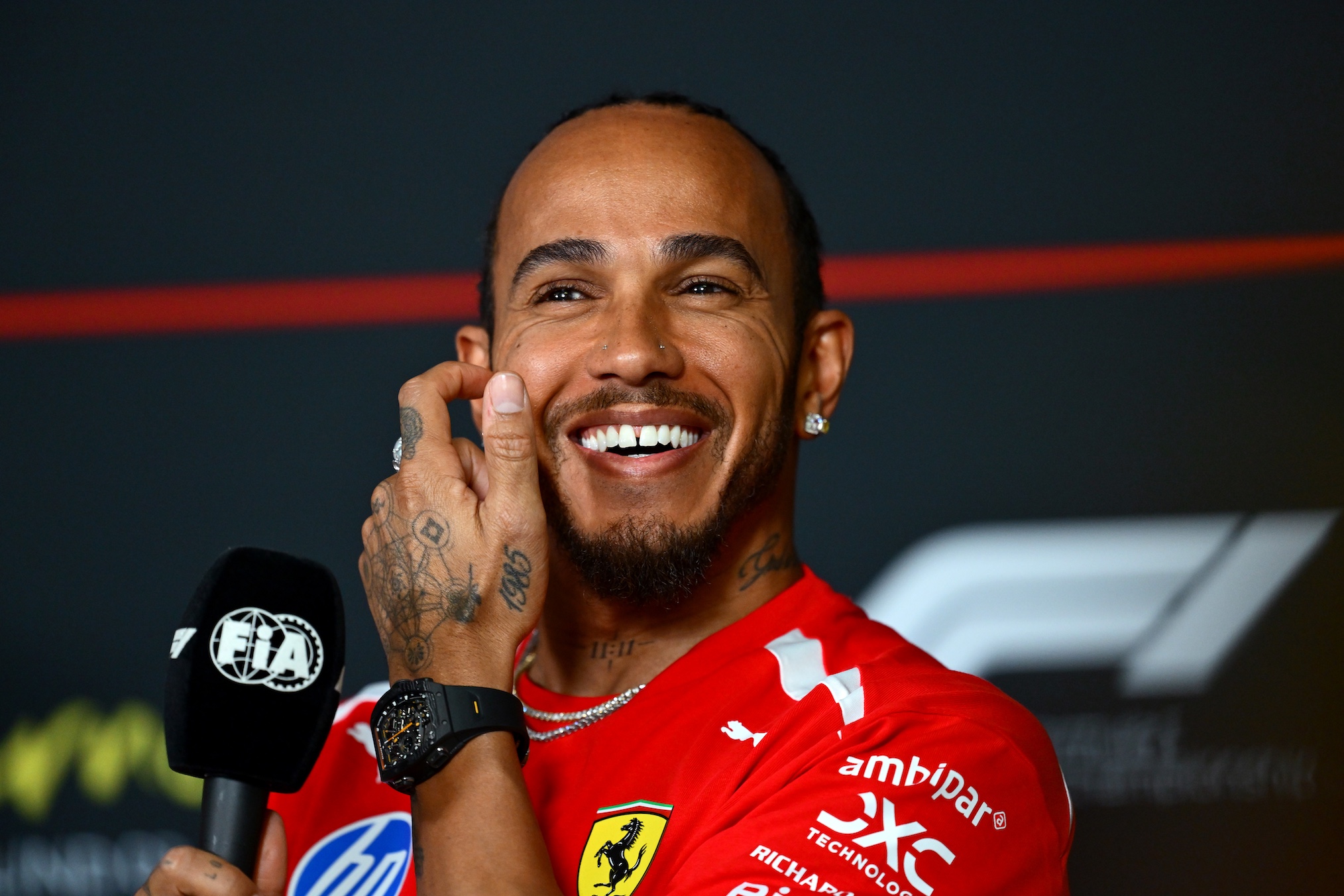MELBOURNE, AUSTRALIA - MARCH 05: Lewis Hamilton of Great Britain and Scuderia Ferrari looks on in the Drivers Press Conference during previews ahead of the F1 Grand Prix of Australia at Albert Park Grand Prix Circuit on March 05, 2026 in Melbourne, Australia.