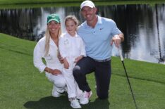 Erica Stoll, Poppy McIlroy, and Rory McIlroy of Northern Ireland pose for a photo on the fifth hole during the Par Three Contest prior to the 2025 Masters Tournament at Augusta National Golf Club on April 09, 2025 in Augusta, Georgia.