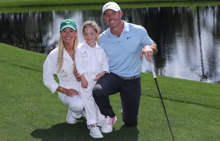Erica Stoll, Poppy McIlroy, and Rory McIlroy of Northern Ireland pose for a photo on the fifth hole during the Par Three Contest prior to the 2025 Masters Tournament at Augusta National Golf Club on April 09, 2025 in Augusta, Georgia.