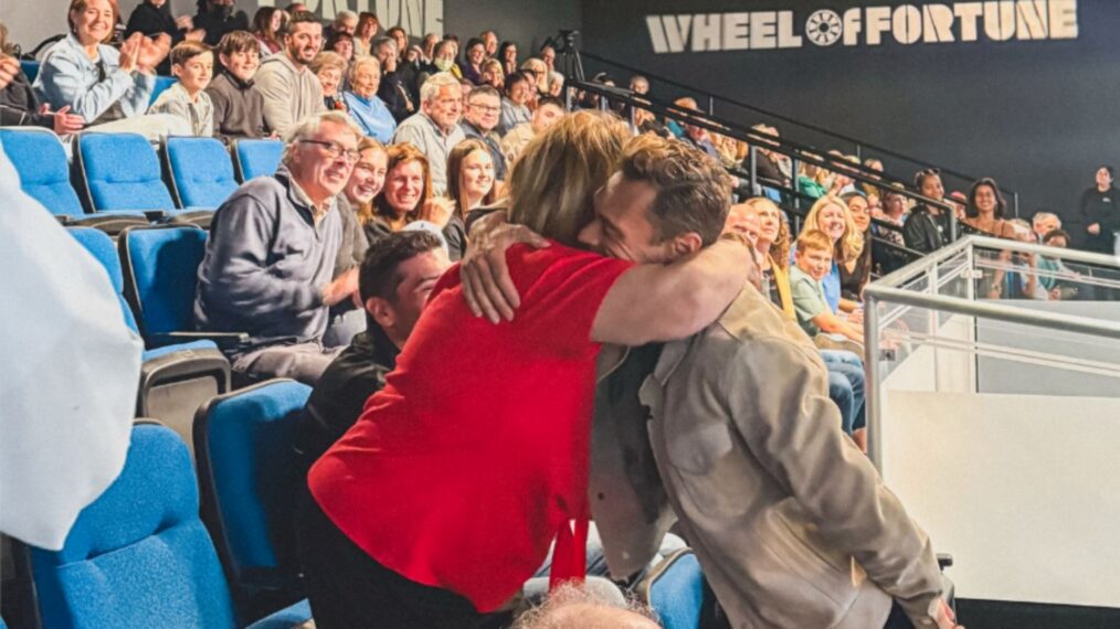 Ryan Seacrest hugging a 'Wheel of Fortune' audience member on March 25, 2026