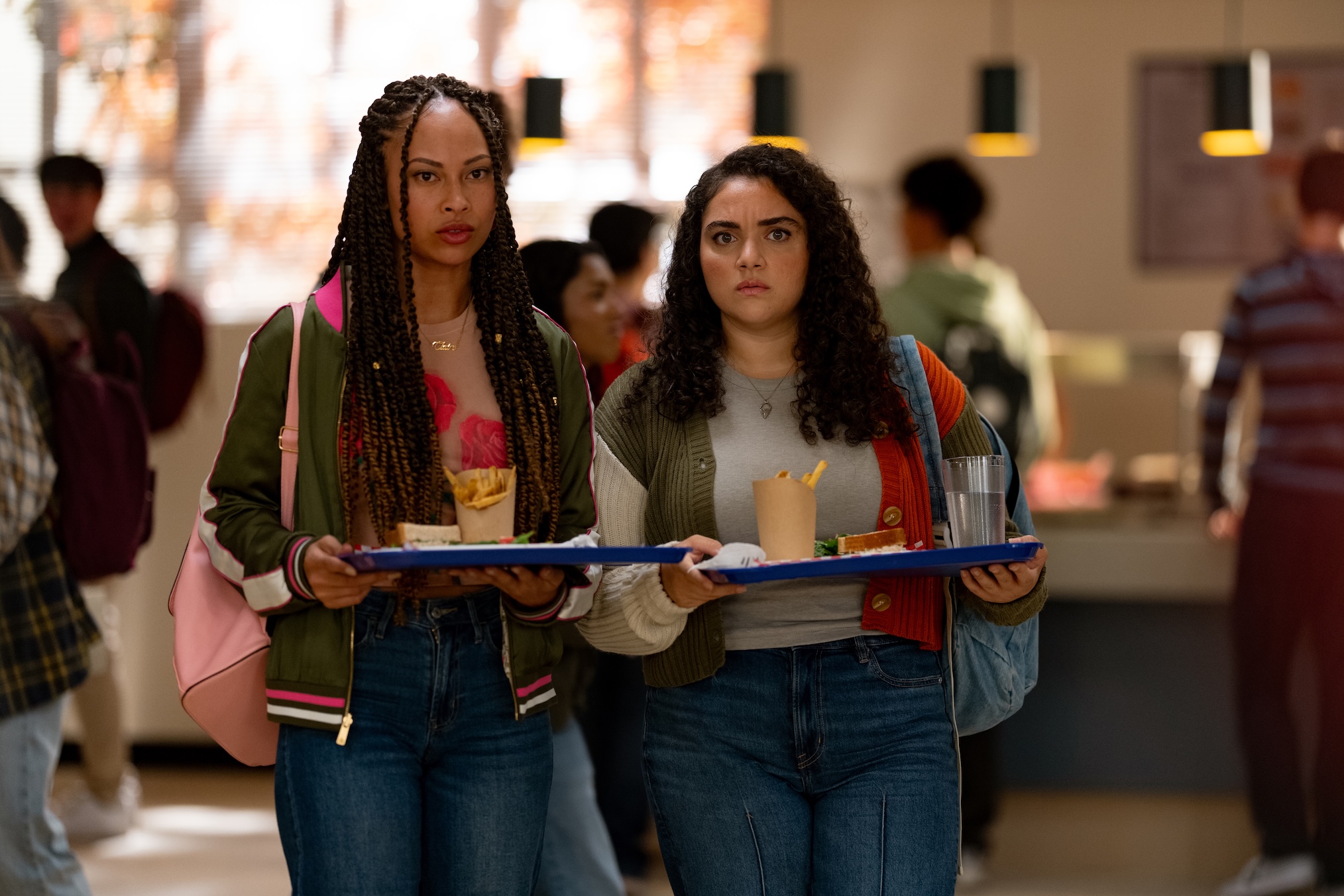 Rainbow Wedell as Claire Zomer and Kiara Pichardo as Nicole Herrera in 'School Spirits' Season 3