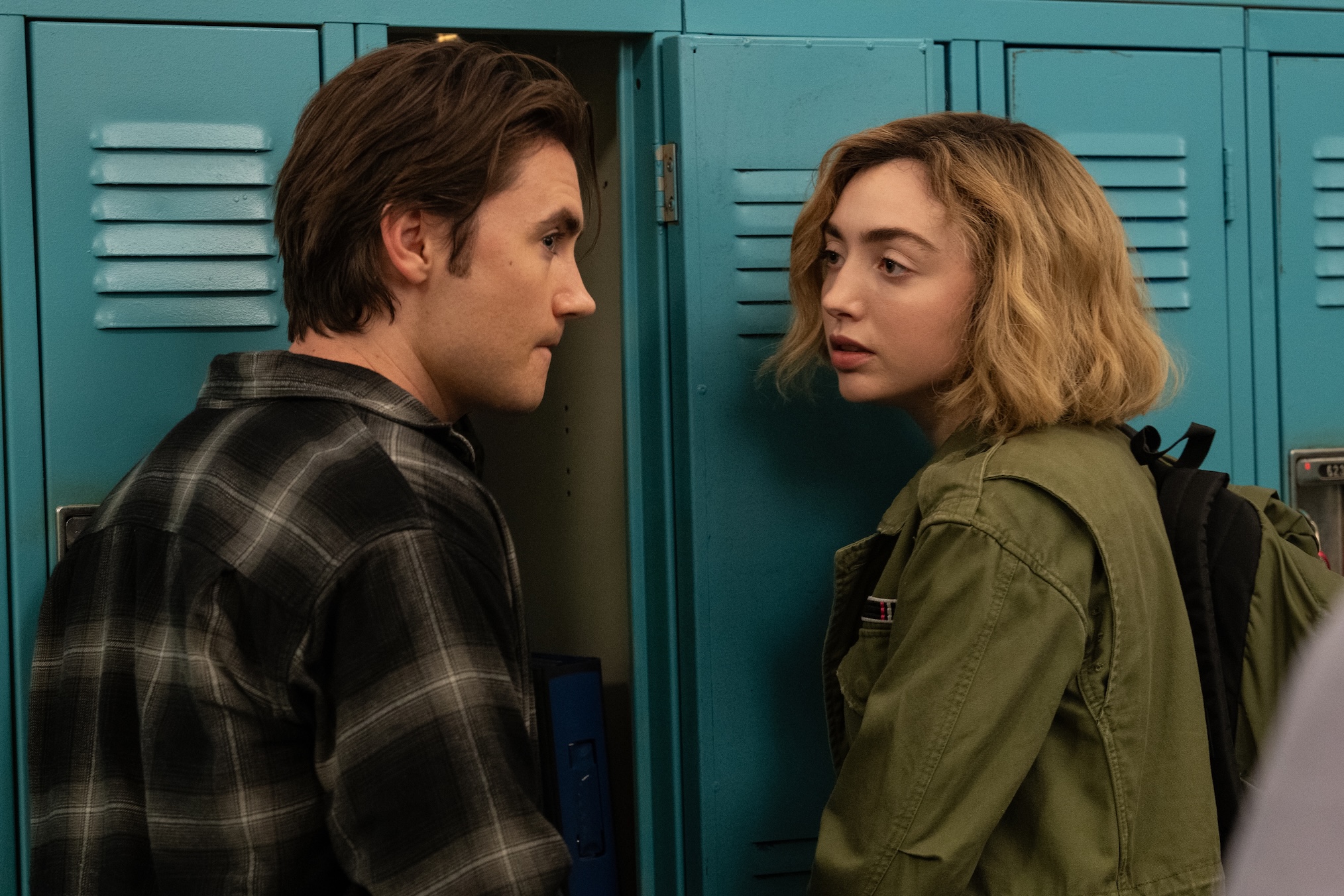 Spencer Macpherson as Xavier Baxter and Peyton List as Maddie Nears in 'School Spirits' Season 3