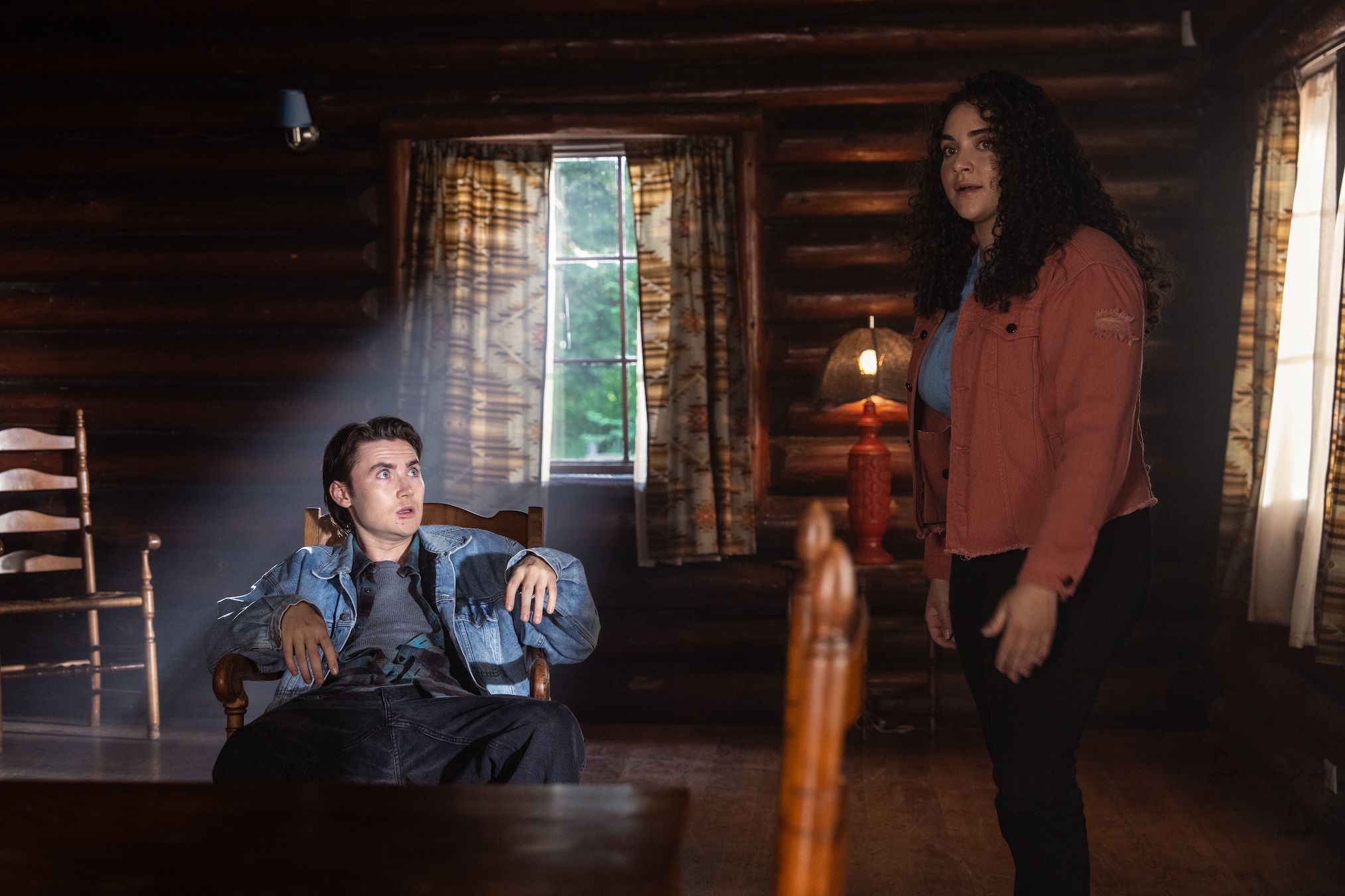 Spencer Macpherson as Xavier Baxter and Kiara Pichardo as Nicole Herrera in 'School Spirits' Season 2