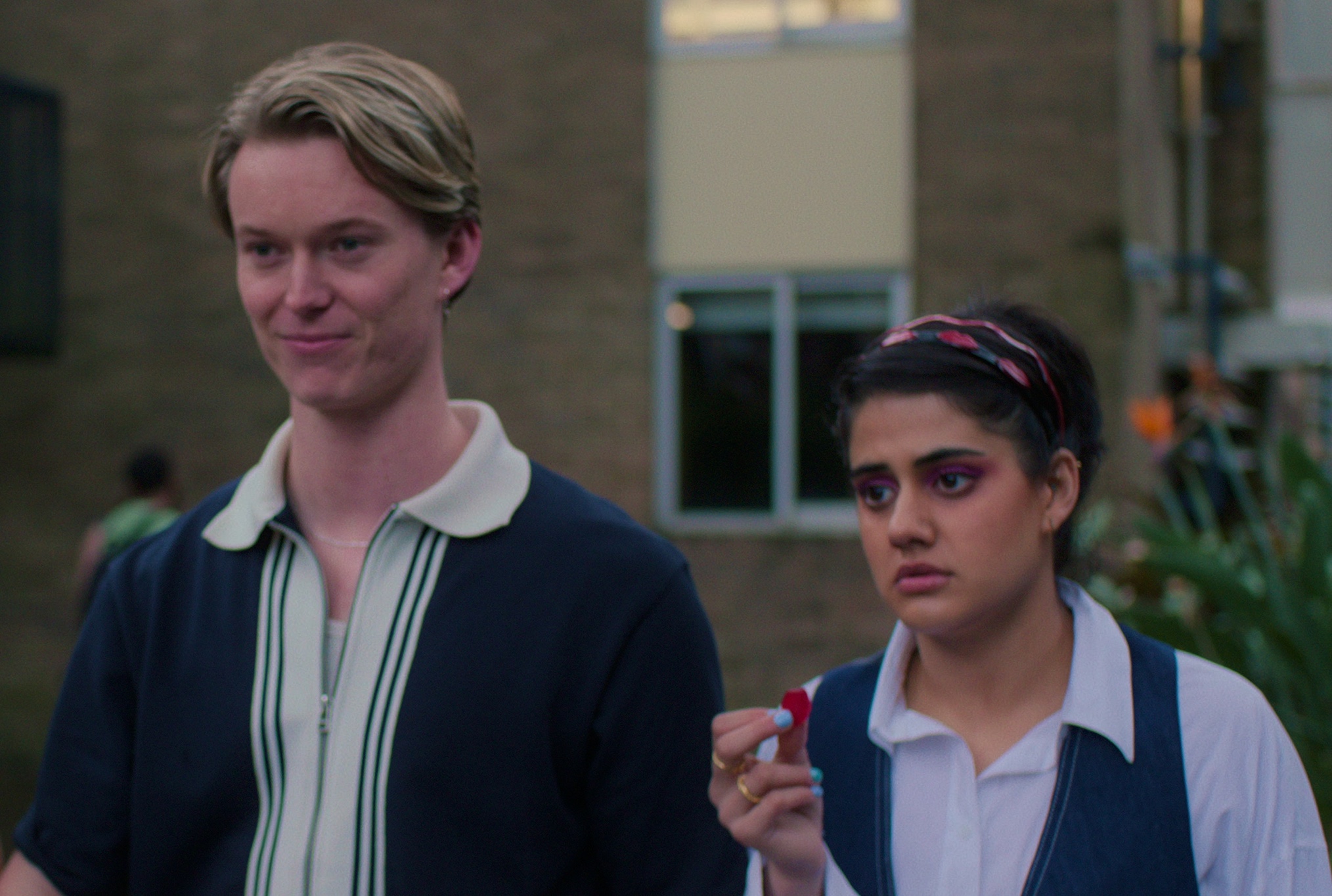 Bryn Chapman Parish as Spider, Ayesha Madon as Amerie in Heartbreak High S2.