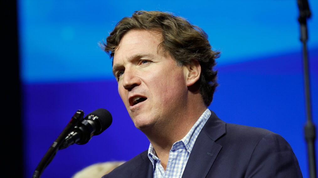 Tucker Carlson speaks during a Turning Point Action campaign rally on October 23, 2024, in Duluth, Georgia