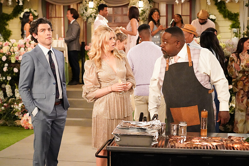 “Welcome to Goodbye” – Two joyful wedding celebrations bring loved ones together while old tensions and heartfelt confessions surface one last time. Meanwhile, tough goodbyes loom and the family looks ahead to a new chapter shaped by love, growth and change, on the series finale of THE NEIGHBORHOOD, Monday, May 11 (8:00-8:30 PM, ET/PT) on the CBS Television Network, and streaming on Paramount+ Pictured: Max Greenfield as Dave, Beth Behrs as Gemma and Cedric The Entertainer as Calvin. Photo: Monty Brinton/CBS ©2026 CBS Broadcasting, Inc. All Rights Reserved.