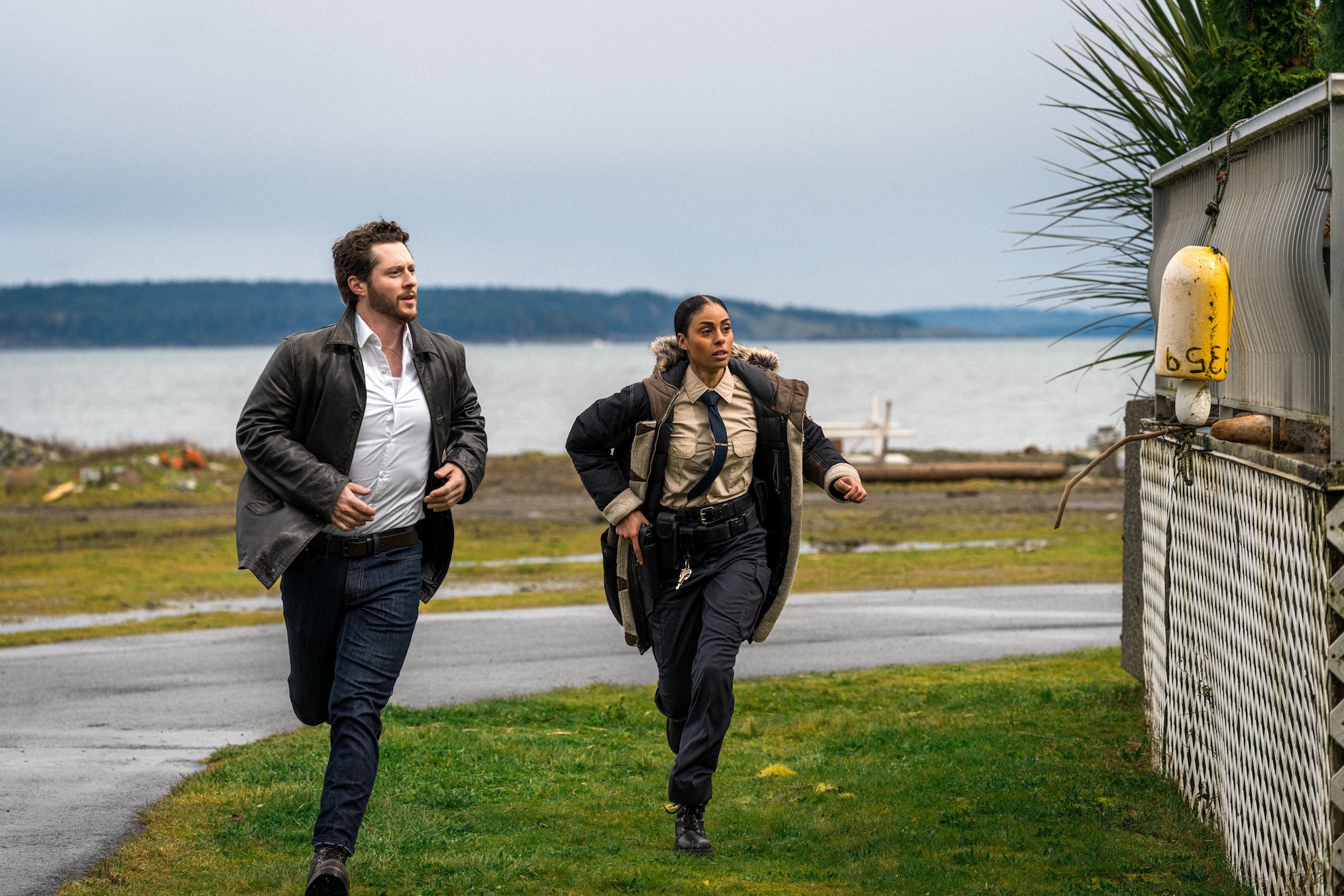 Noah Reid and Clark Backo investigating a mystery in the AMC Yaga Thriller series