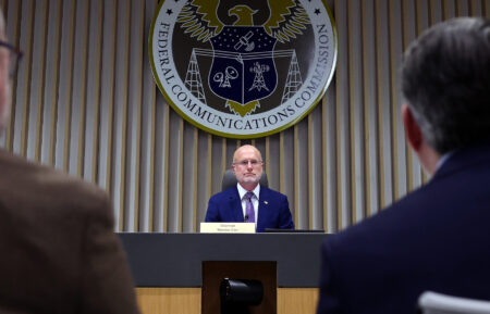 Chairman of the Federal Communications Commission (FCC) Brendan Carr participates in a meeting at the FCC headquarters on February 18, 2026, in Washington, D.C.