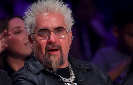 Guy Fieri watches during the Celebrity Game during 2026 NBA All-Star at The Kia Forum on