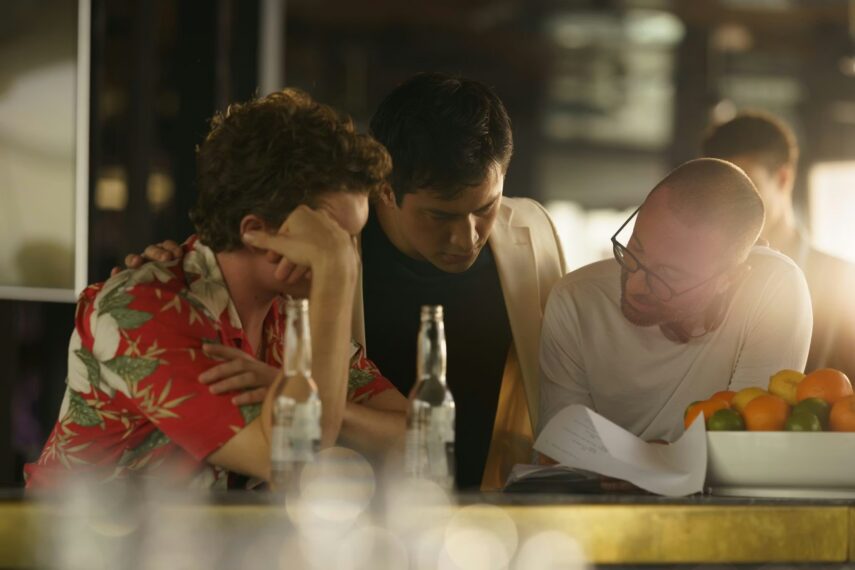 Connor Storrie, Hudson Williams, and Jacob Tierney on set of Heated Rivalry Season 1