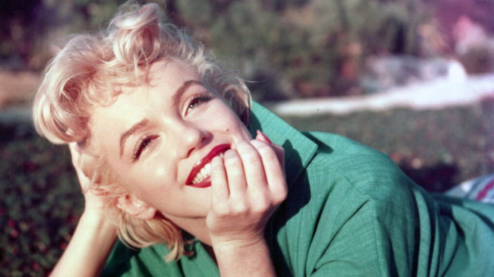 PALM SPRINGS, CA - 1954: Actress Marilyn Monroe poses for a portrait laying on the grass in 1954 in Palm Springs, California. (Photo by Baron/Hulton Archive/Getty Images)
