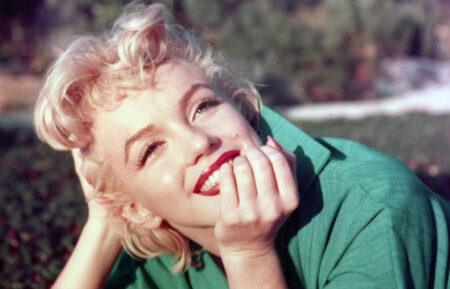 PALM SPRINGS, CA - 1954: Actress Marilyn Monroe poses for a portrait laying on the grass in 1954 in Palm Springs, California. (Photo by Baron/Hulton Archive/Getty Images)