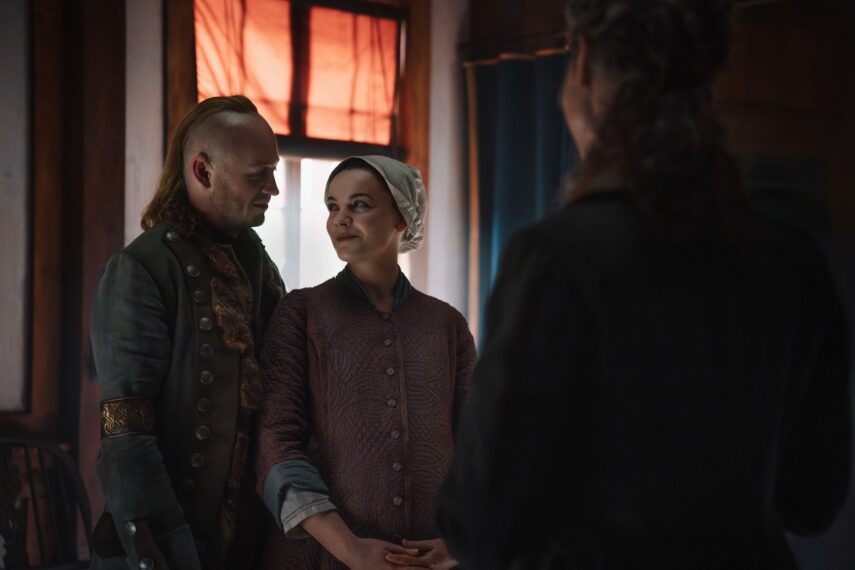 Outlander John Bell, Izzy Meikle-Small, Catriona Balfe (back to camera), (Season 8, ep. 801, aired March 6, 2026).