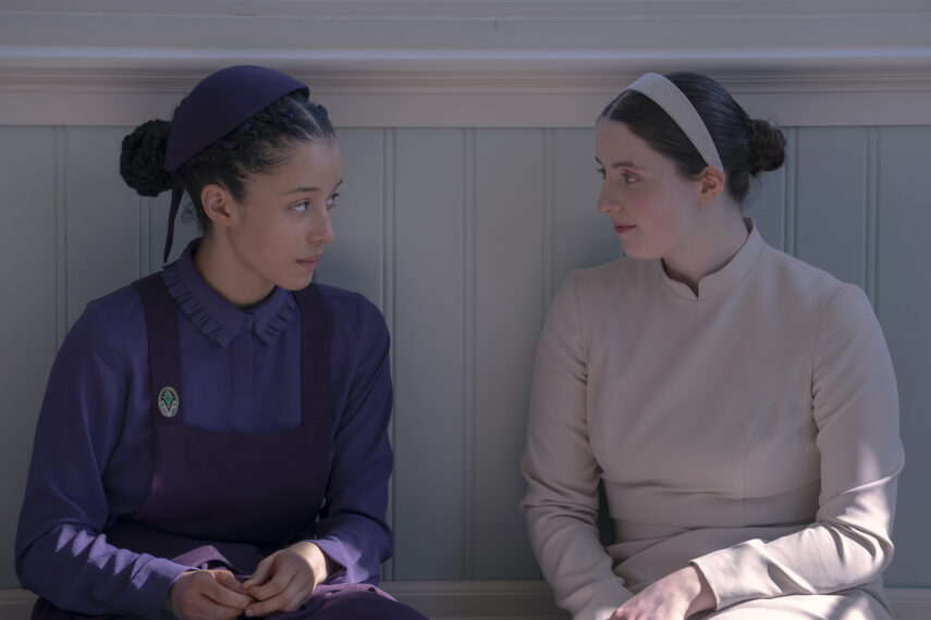 Chase Infiniti as Agnes and Lucy Halliday as Daisy in 'The Testaments' Season 1 Episode 3