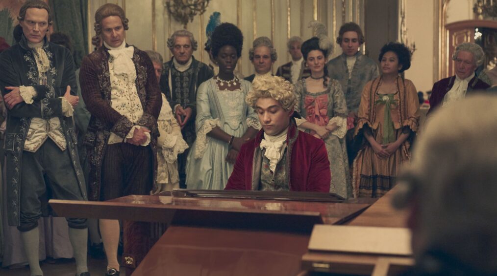 AMADEUS, Paul Bettany as Antonio Salieri (left), Will Sharpe as Wolfgang Amadeus Mozart (front, seated), (Season 1, ep. 101, aired in US on May 8, 2026). photo: Adrienn Szabo / ©Starz/Sky UK Ltd. / Courtesy Everett Collection