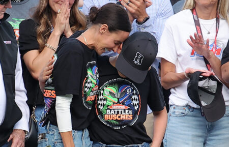 Kyle Busch's wife, Samantha Busch, and their son Brexton at a NASCAR event