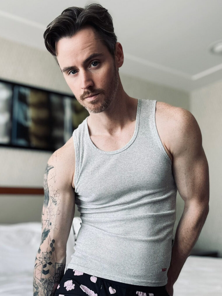 Daniel Benson poses for an X photo