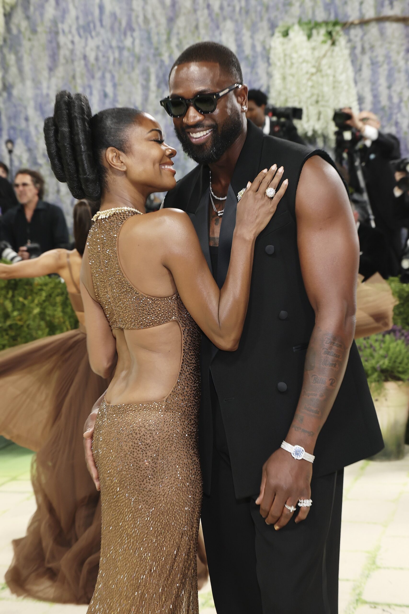 Gabrielle Union-Wade and Dwyane Wade attend the 2026 Met Gala celebrating 