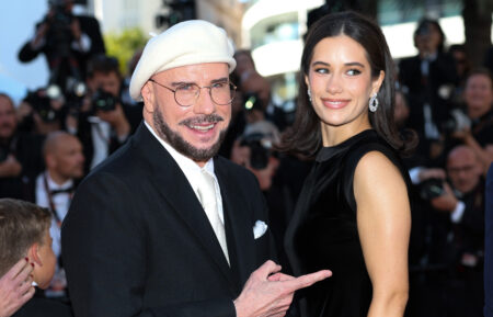 John Travolta and Ella Bleu Travolta attend the "Karma" screening during the 79th annual Cannes Film Festival at Palais des Festivals on May 15, 2026