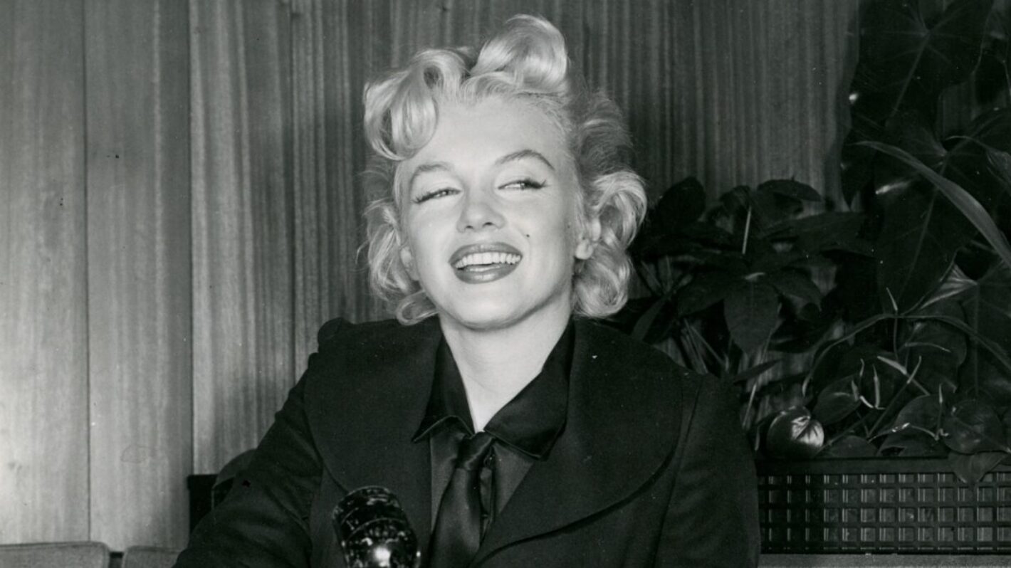 Marilyn Monroe at a London press conference at the Savoy Hotel, prior to filming THE PRINCE AND THE SHOWGIRL, 1956 -