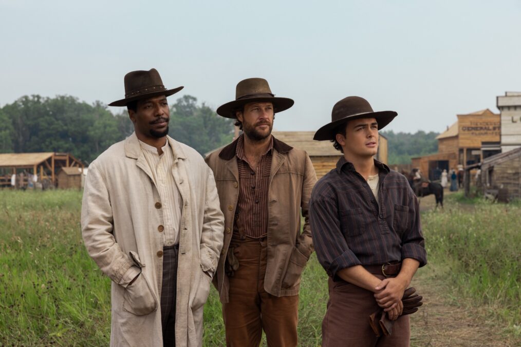 Little House on the Prairie. (L to R) Jocko Sims as Dr. George Tann, Luke Bracey as Charles Ingalls, Maclean Fish as Adam Scott in episode 105 of Little House on the Prairie. Cr. Eric Zachanowich/Netflix © 2026