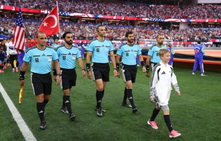 The Kia Official Match Ball carrier and match officials during the FIFA World Cup 2026 Group D match between Türkiye and USA at Los Angeles Stadium on June 25, 2026 in Inglewood, California.