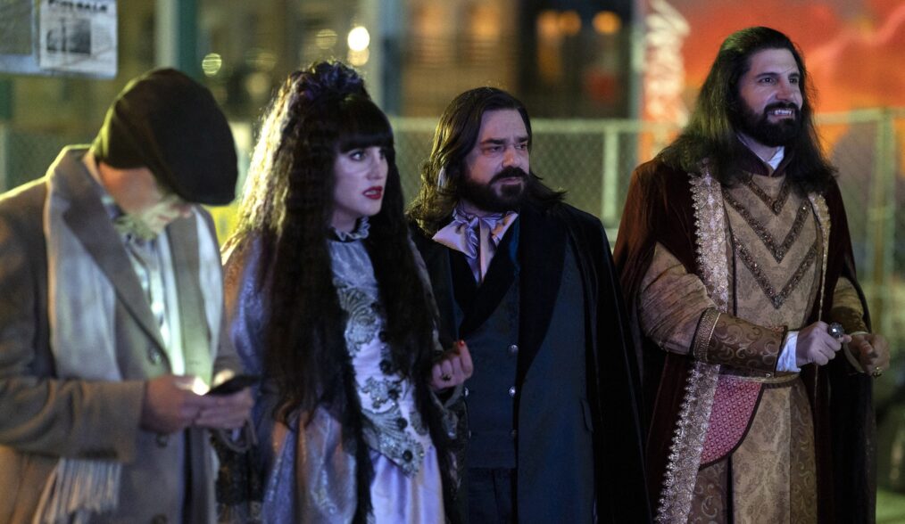 WHAT WE DO IN THE SHADOWS, from left: Mark Proksch, Natasia Demetriou, Matt Berry, Kayvan Novak, ‘Come Out and Play', (Season 6, ep. 609, aired Dec. 2, 2024). photo: Russ Martin / ©FX / Courtesy FX via Everett Collection
